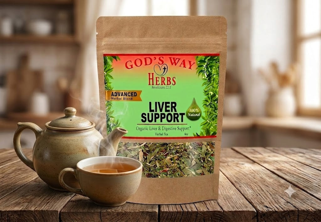 God's Way Herbs Liver Support herbal tea sits on a rustic wooden table beside a ceramic teapot and a cup of tea, with a softly blurred kitchen background.